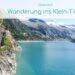 Bild zeigt blauen Stausee inmitten von Bergen - oben ein Textoverlay: "Österreich - Wanderung ins Klein-Tibet"